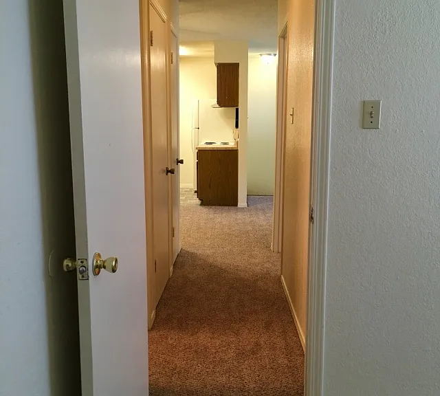 Hall from Master Bedroom, past 2nd Bedroom, to Living, Dining, Kitchen
