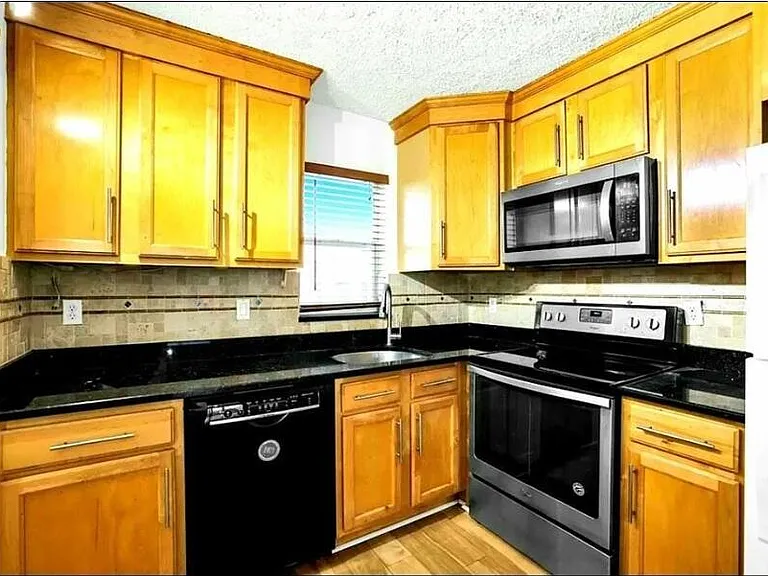 9355 SW 8th St #408 — Photo 1