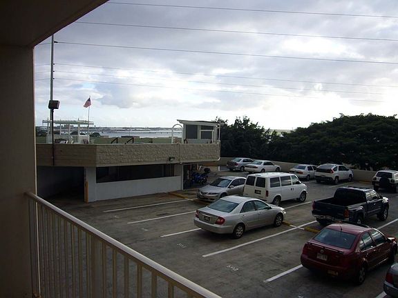 view from lanai overlooking pool and Pearl Harbor
