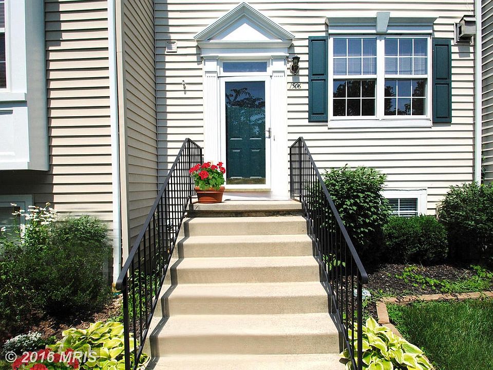 Lushly Landscaped Entry/ 2 Assigned Parking Spaces