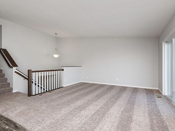 Soaring ceilings and lots of natural light keep this home feeling open and spacious.