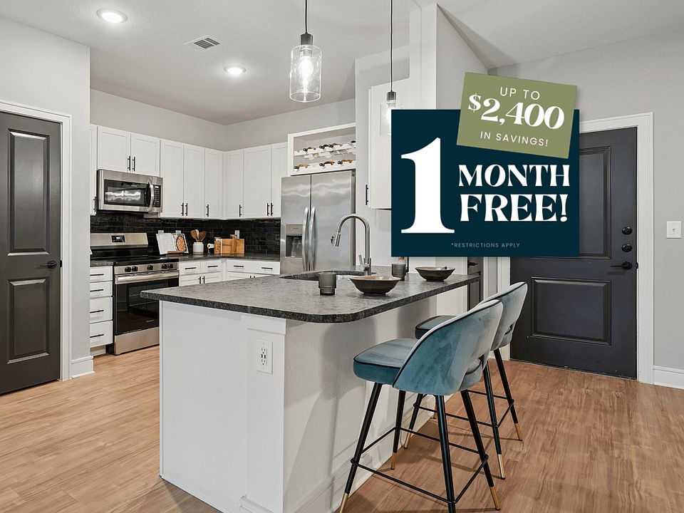 Kitchen with Granite Countertop and Stainless Steel Appliances.