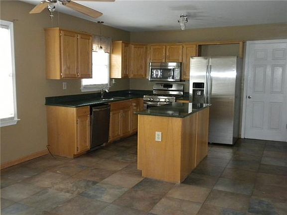 Kithen leading to the laundry room and garage