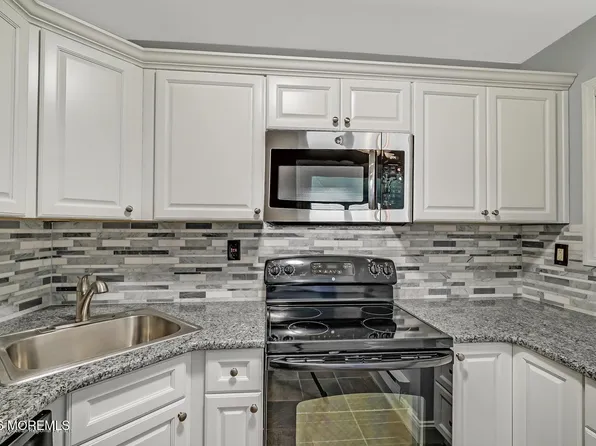 87 Arrowood Road #E, Manalapan, NJ 07726