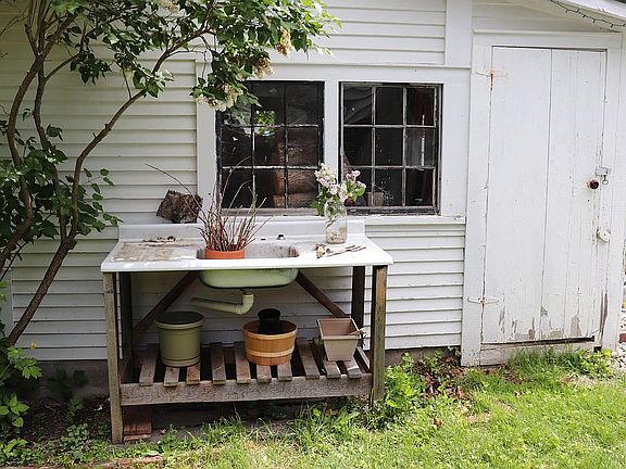 Shed, potting bench, sink.