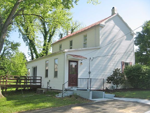 Side View from driveway (with main side and lower floor entr
