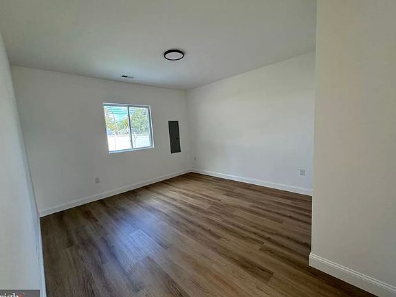 First Floor bedroom area that leads to another room.