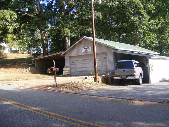 Detached 2 car garage and carport