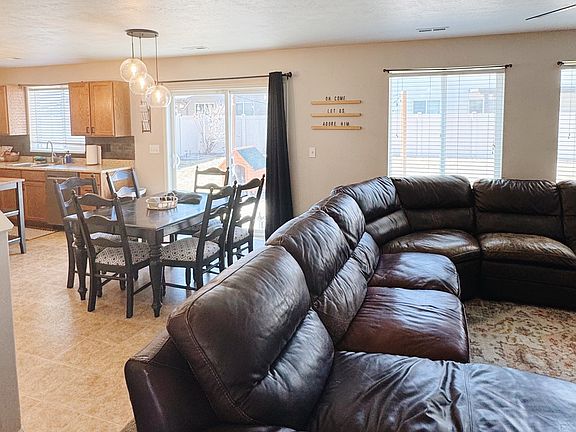 Family Room + Kitchen | open concept, lots of windows and natural lighting.