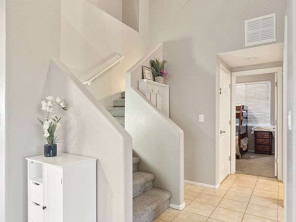 Hallway leading to 3 bedrooms on the second floor.