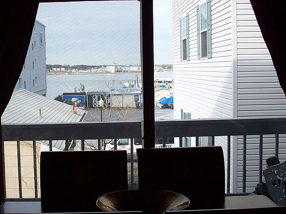 View from deck of marina, bay, bridge