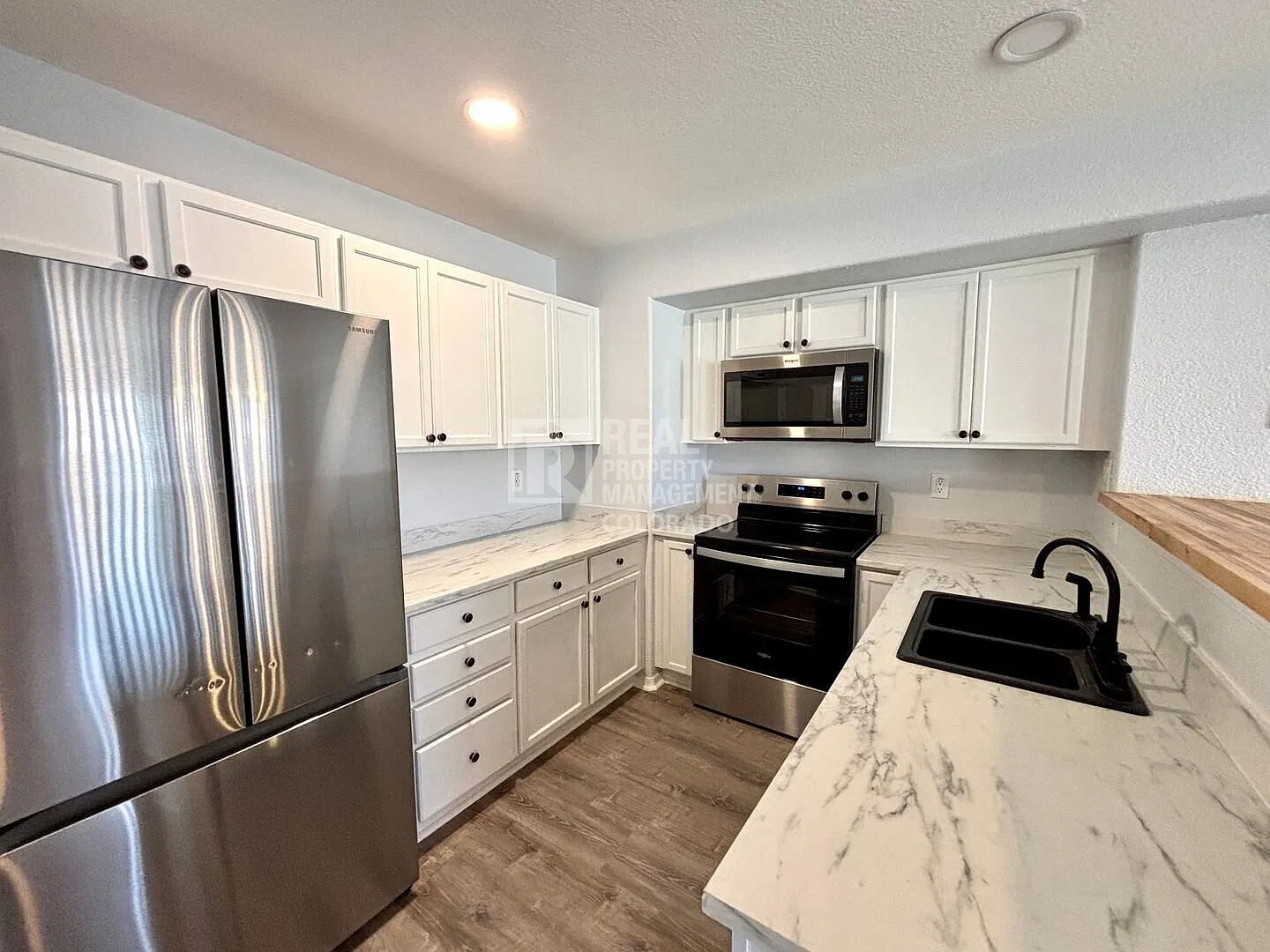 Spacious 4-Bedroom Townhome with Modern Updates — Photo 4