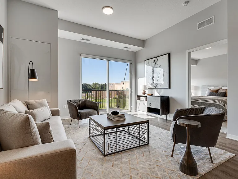 Relax in your living space with warm flooring and inviting ambiance.