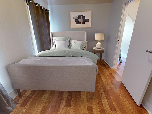 Bedroom 1. This image shows a virtually furnished space. Bedrooms come unfurnished.