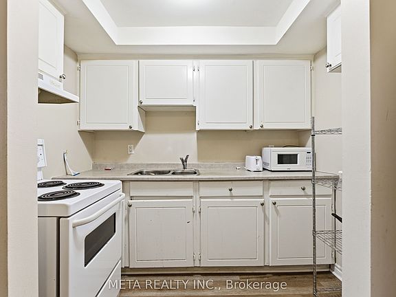 5th image of 25 College St E #103