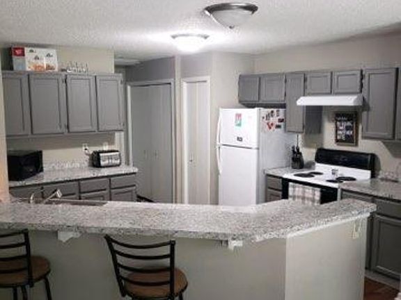 3rd image of 9816 Palm St NW
