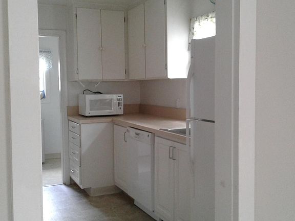 A view of the kitchen from the living room.