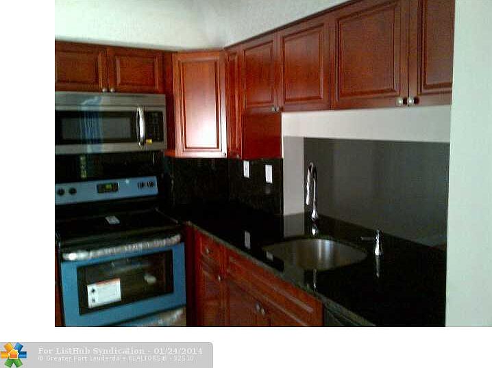 1st image of 401 Gardens Dr APT 204