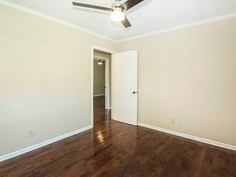Spacious bedroom #2 with good wall space for furnishings