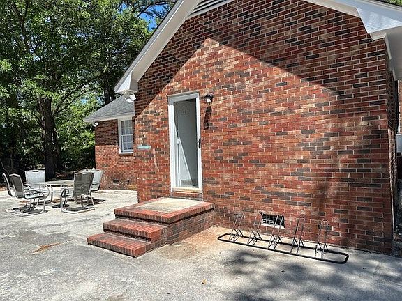 Outdoor dining table and bike rack