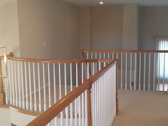 Second floor overlook to additional bedrooms & full bath.