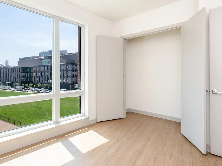 The Flats - Bedroom with Oversized Windows