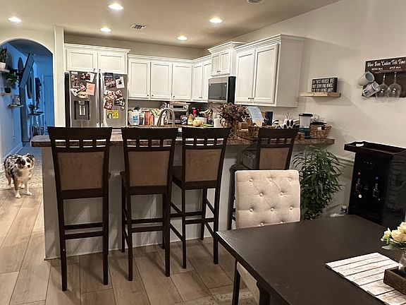 Dining Area looking at Kitchen with Bartop