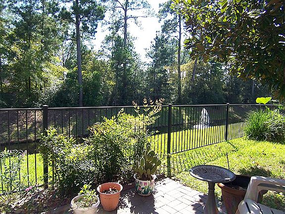 The perfect place to sip your morning coffee on brick paver patio with lovely view and sound of fountain.