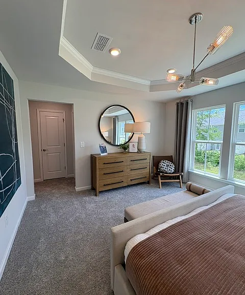Primary bedroom with tray ceiling--please note all furniture and decor will be removed