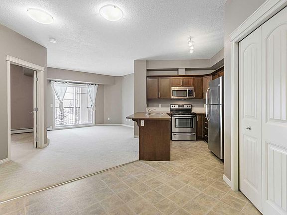 4th image of 2409-175 Panatella Hl NW #2409