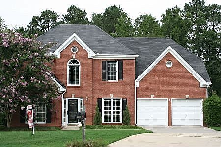 4 bedroom, 2.5 bath Brick Front Traditional Home in Macland Forest Swim/Tennis