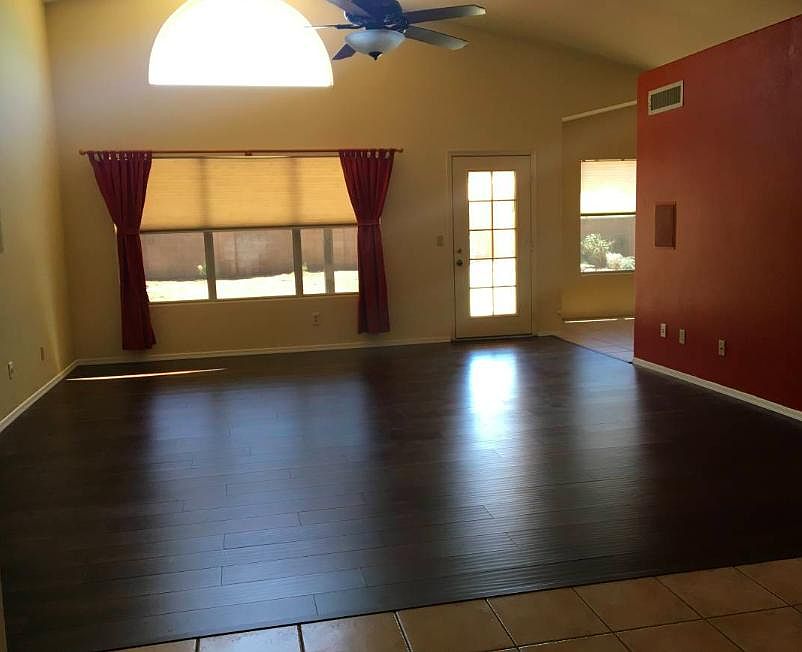 Great room. Vaulted ceiling. New wood flooring. Fresh paint.