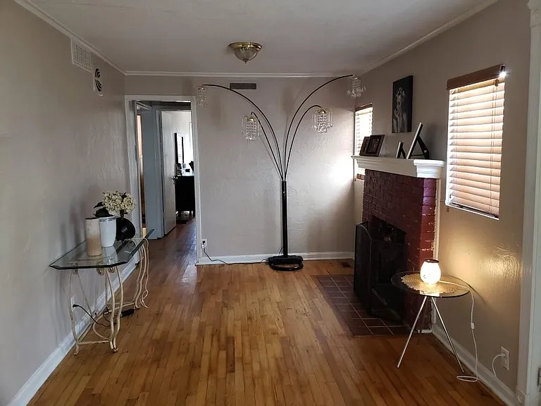 This is the living room area. The front door is to the right of the picture.