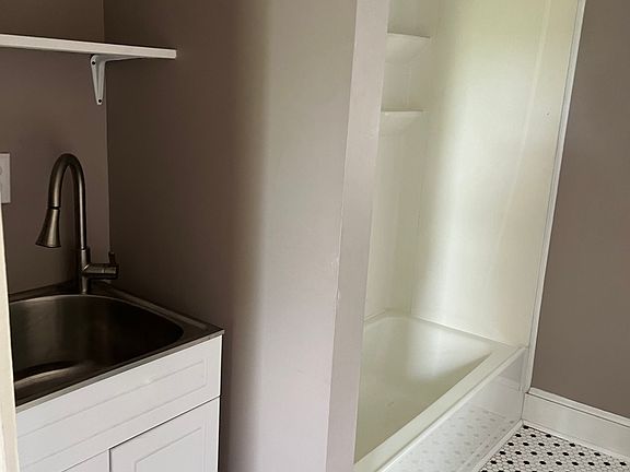 Bathroom with slop sink