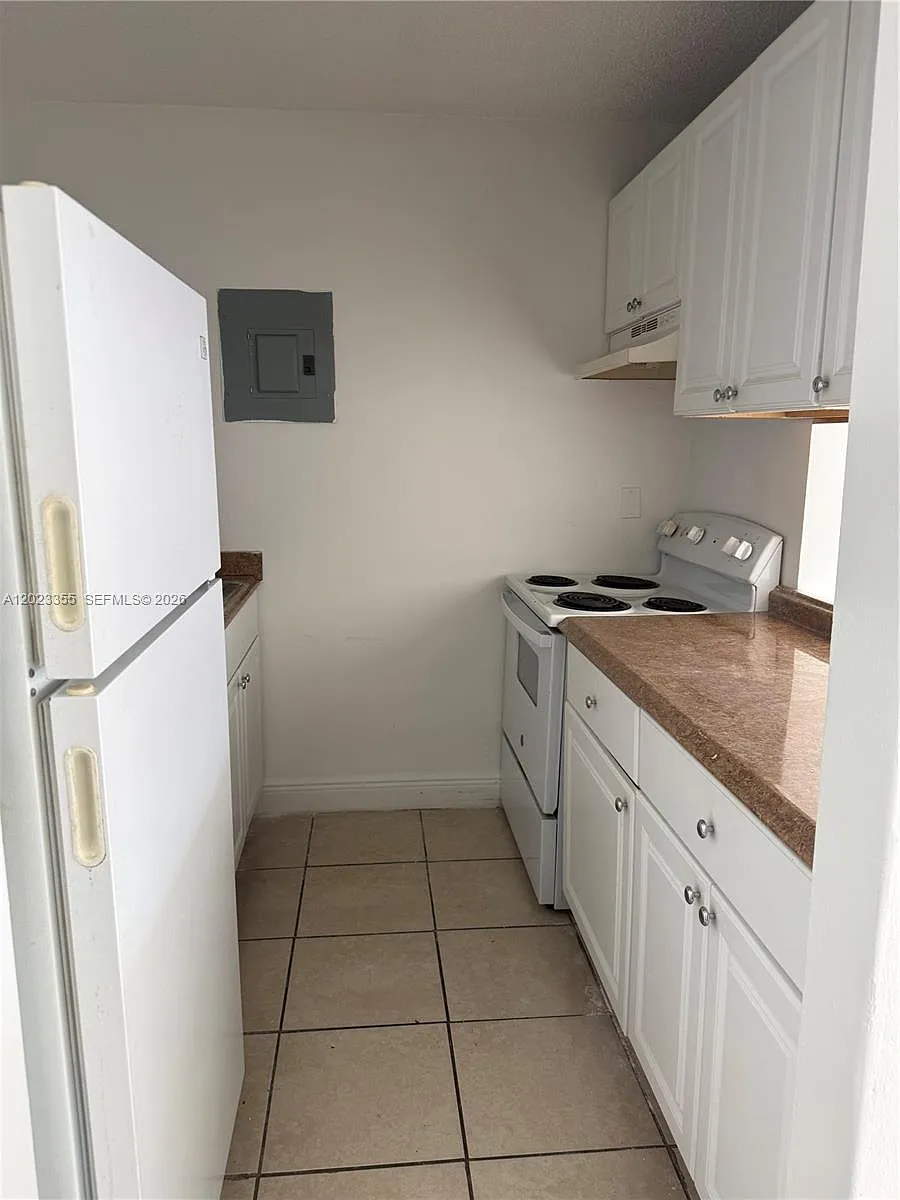 Building Photo - 4495 NW 9th St #105