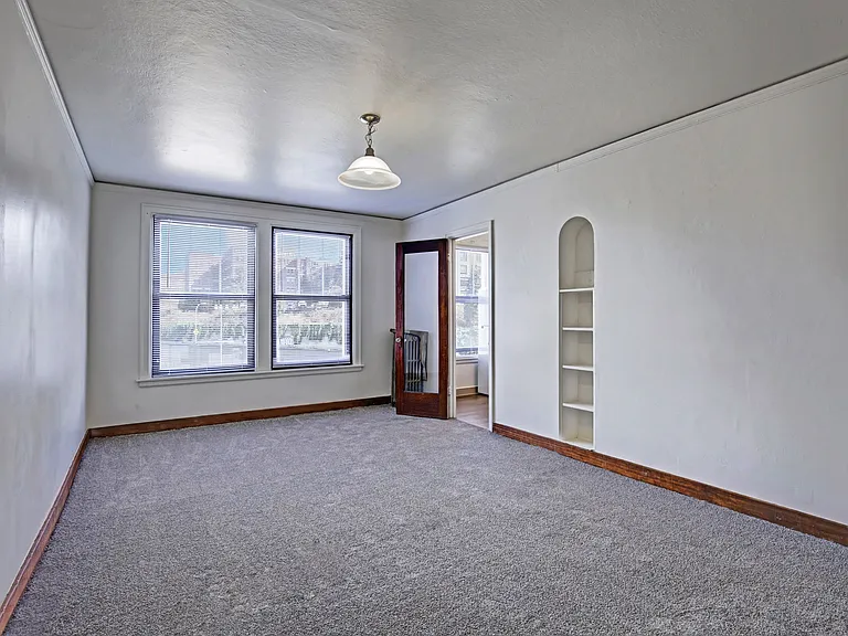 Large Windows for Natural Light with Window Coverings