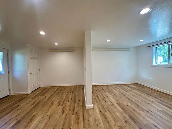 Adjacent entrance/dining area and living room