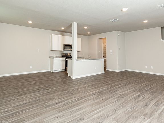 Family Room to Kitchen and Dining Area