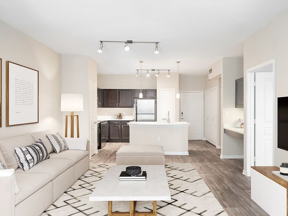 Kitchen and living room with hard surface vinyl plank flooring
