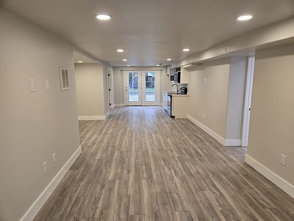 Studio Suite- Living area, Kitchen, LVP Floors, Recessed lighting and large bathroom