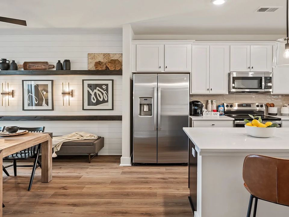 Open-concept dining and kitchen with modern finishes