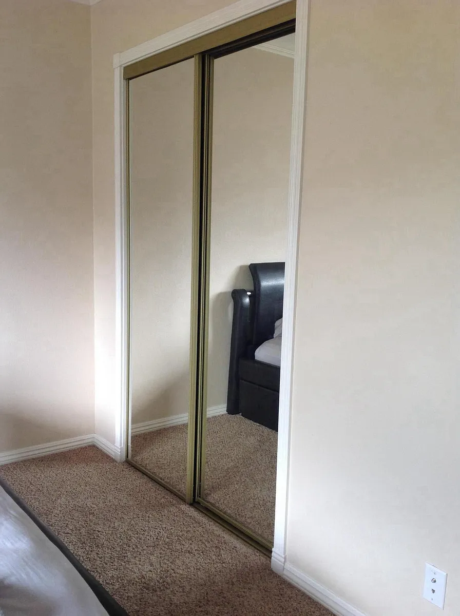 Mirrored closet in bedroom - 141 E Clara St