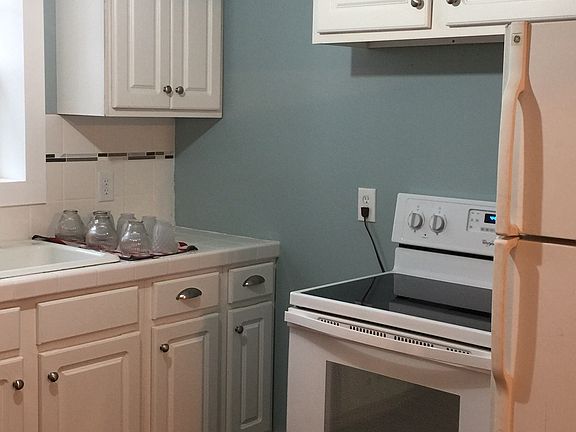 Appliances include new stove and refridgerator