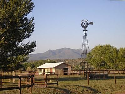 View of mountains, bunk house and windmill