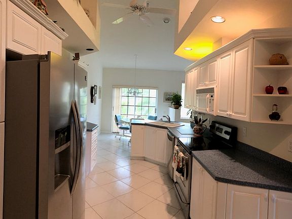 View of golf from kitchen