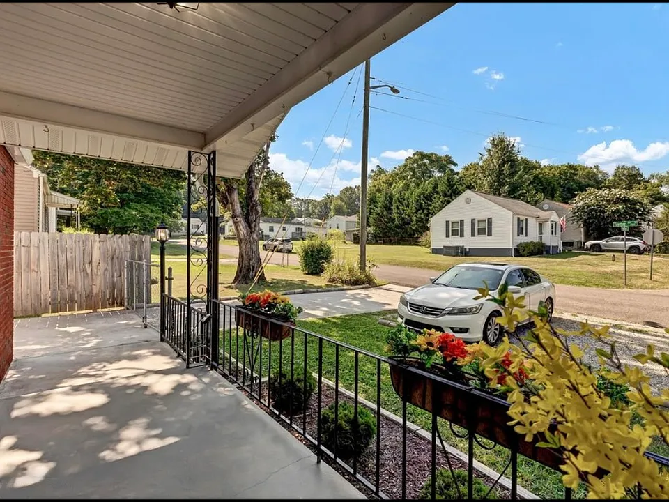spacious front porch on a quiet street