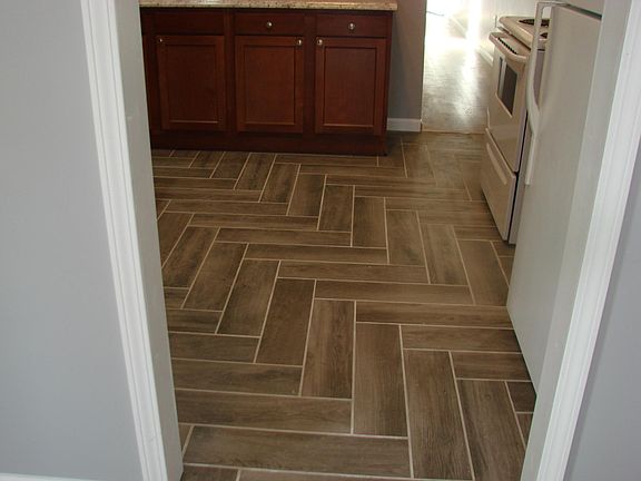 Ceramic tile kitchen floor.