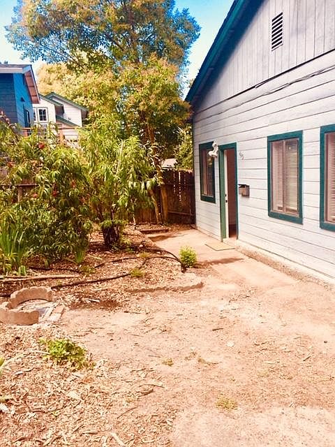 Private entrance faces a shared garden.