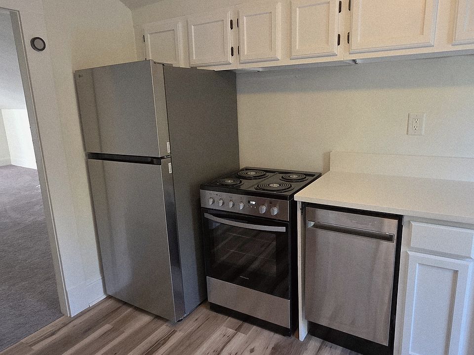 Refrigerator, stove, and dishwasher included.