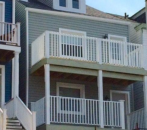 Back of House with two story deck.